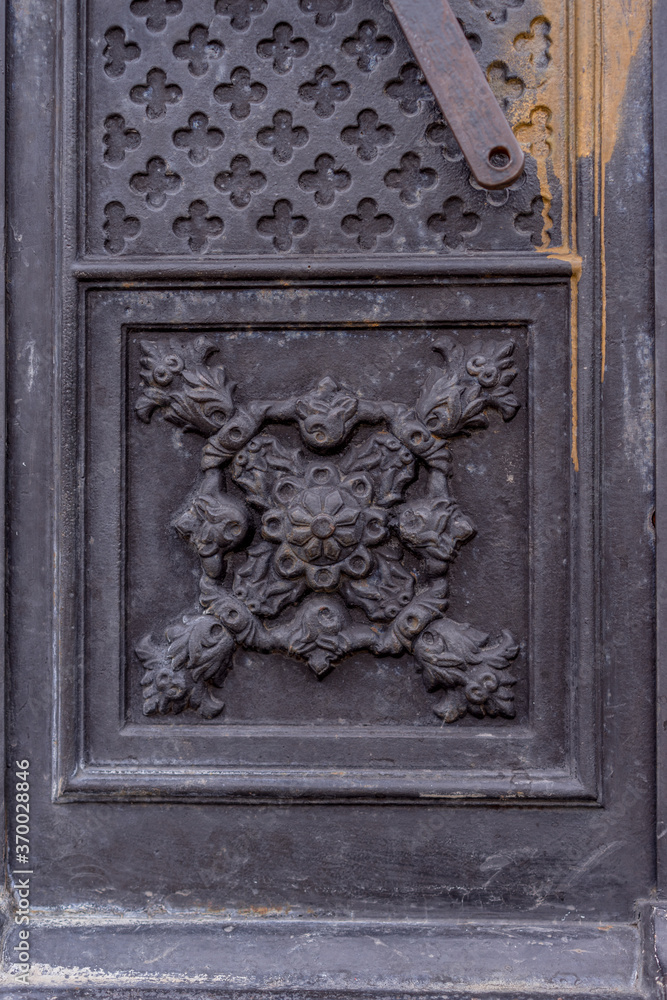 old wooden door with metal door knocker