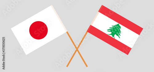 Crossed flags of Lebanon and Japan