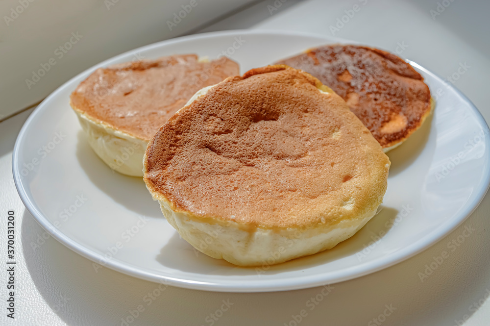 sweet pancakes with breakfast dish close up