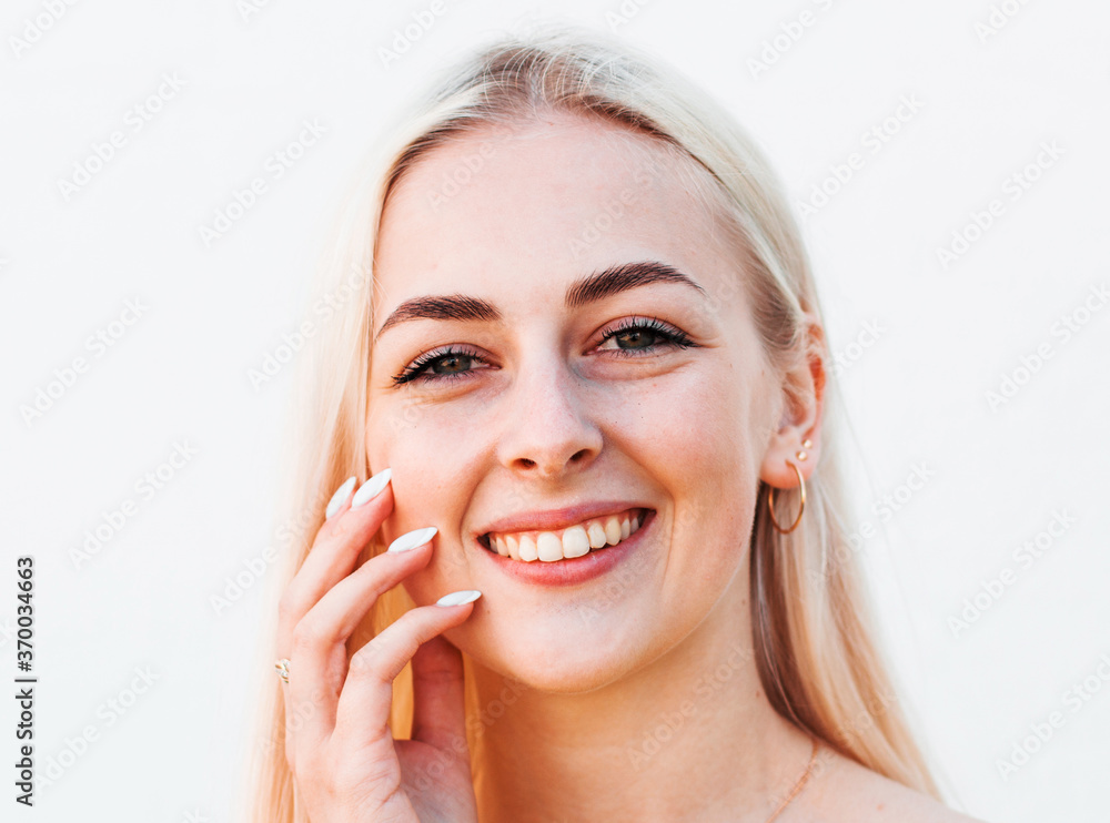 Portrait of young cheerful smiling woman, over white background Portrait of young cheerful smiling woman, over white background