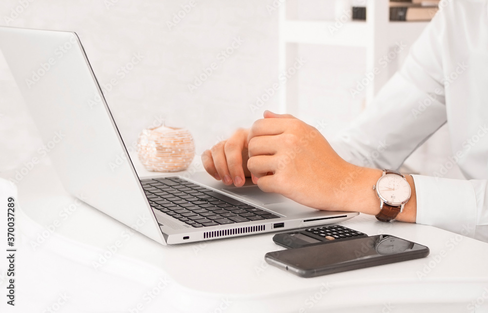Close up shot of hands typing on laptop Close up shot of hands typing on laptop