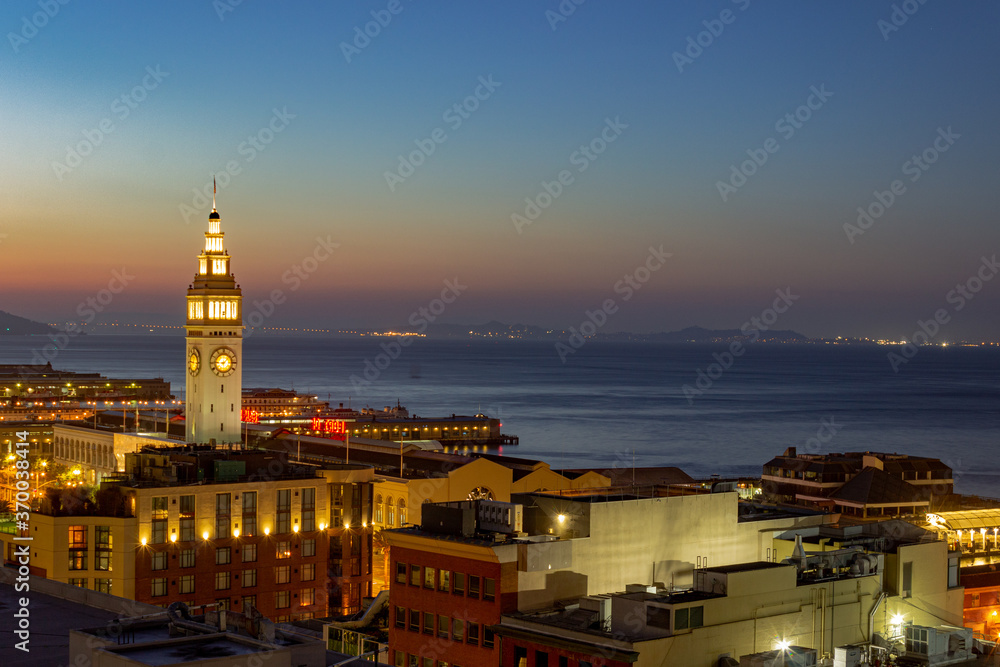 San Francisco Ferry Building terminal at dusk overlooking San Francisco Bay