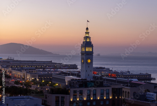 San Francisco Ferry Building terminal at dusk overlooking San Francisco Bay