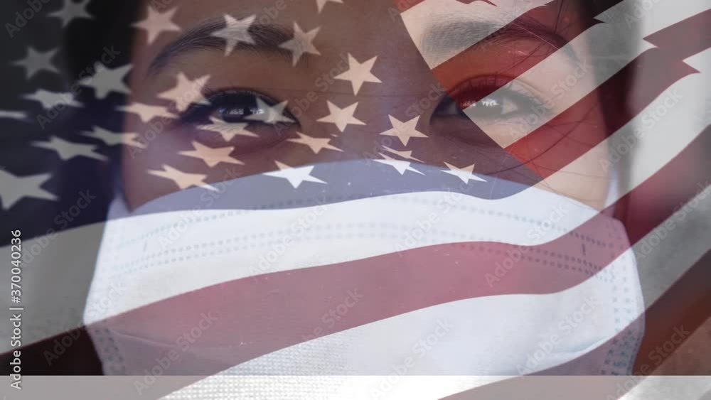 Woman wearing face mask against US flag waving Woman wearing face mask against US flag waving