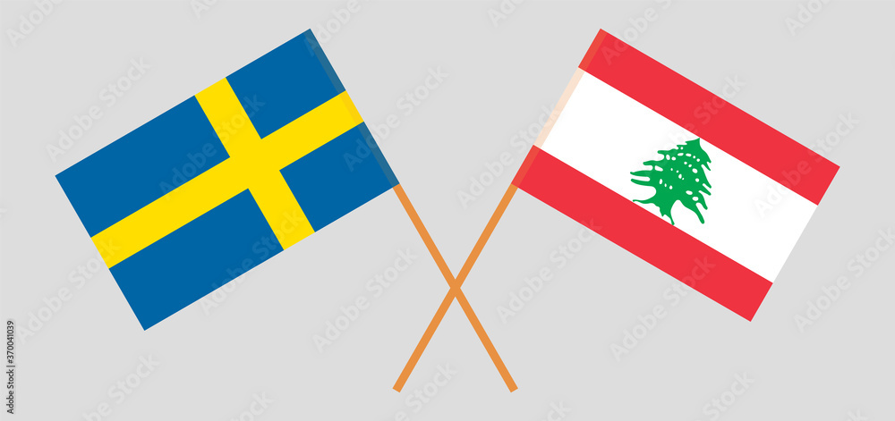 Crossed flags of Lebanon and Sweden