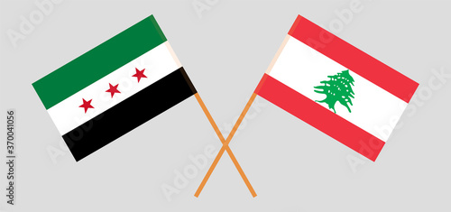 Crossed flags of Lebanon and Interim Government of Syria