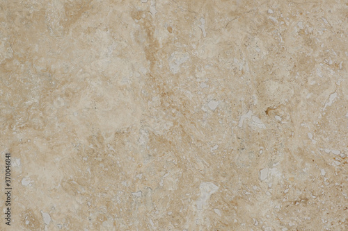 Light brown/beige marble texture background. Old stone wall. 