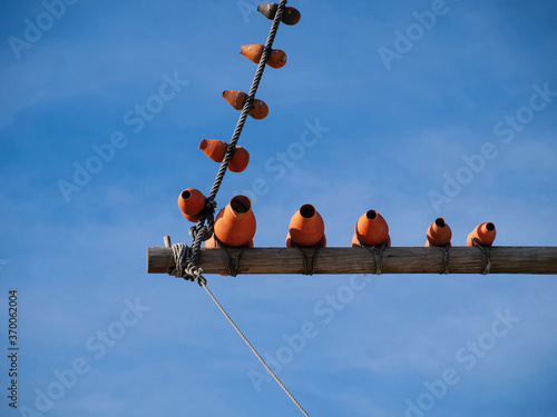 Mediterranean windmill detail of the tip of one of the masts that support a sail 