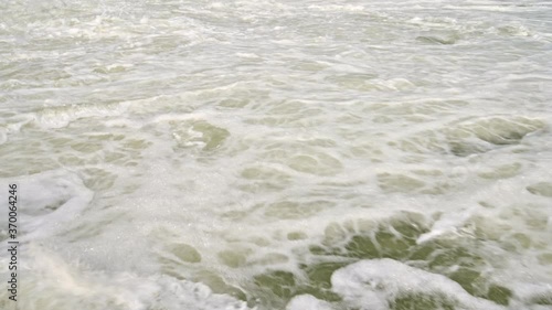 Boiling stream of dam water discharge photo