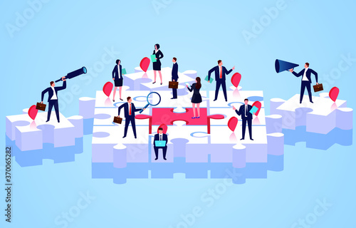 Team members standing on puzzles, teamwork and puzzles