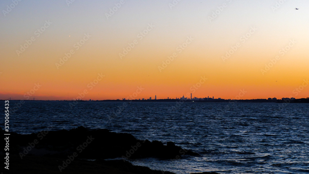 Beautiful Sunset over the Long Island Sound with New York City in the background