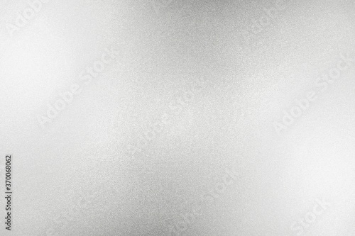Glowing white silver glitter paper wall with copy space, abstract texture background