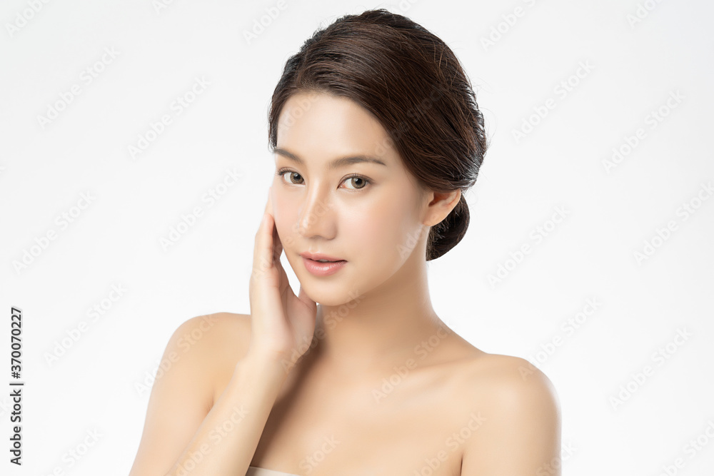 Beautiful Young asian Woman with Clean Fresh Skin, on white background, Face care, Facial treatment, Cosmetology, beauty and spa, Asian women portrait Beautiful Young asian Woman with Clean Fresh Skin, on white background, Face care, Facial treatment, Cosmetology, beauty and spa, Asian women portrait
