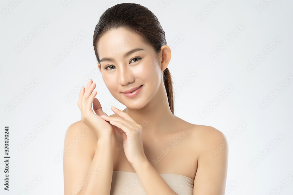 Beautiful Young asian Woman with Clean Fresh Skin, on white background, Face care, Facial treatment, Cosmetology, beauty and spa, Asian women portrait Beautiful Young asian Woman with Clean Fresh Skin, on white background, Face care, Facial treatment, Cosmetology, beauty and spa, Asian women portrait