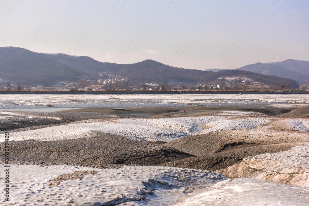The sea water exiting the tidal flat. The sea water exiting the tidal flat.