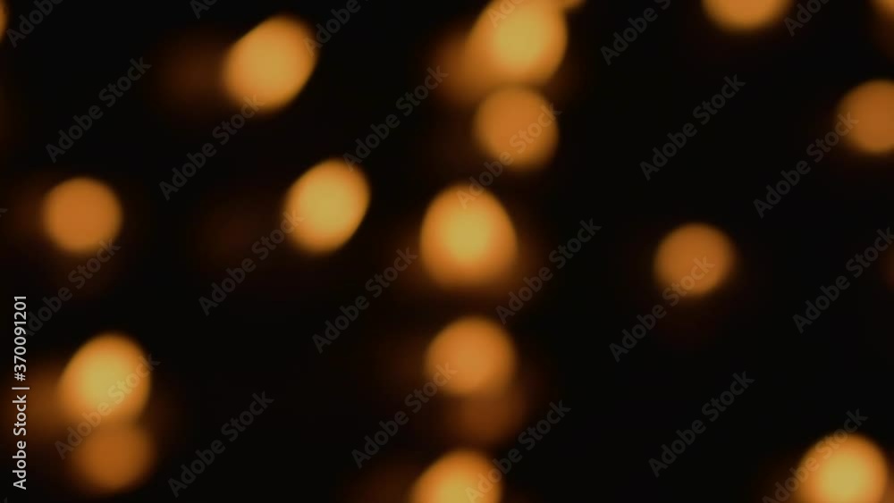 Diya Lamp bokeh in dark blurry background at night. Diya Lamp bokeh in dark blurry background at night.