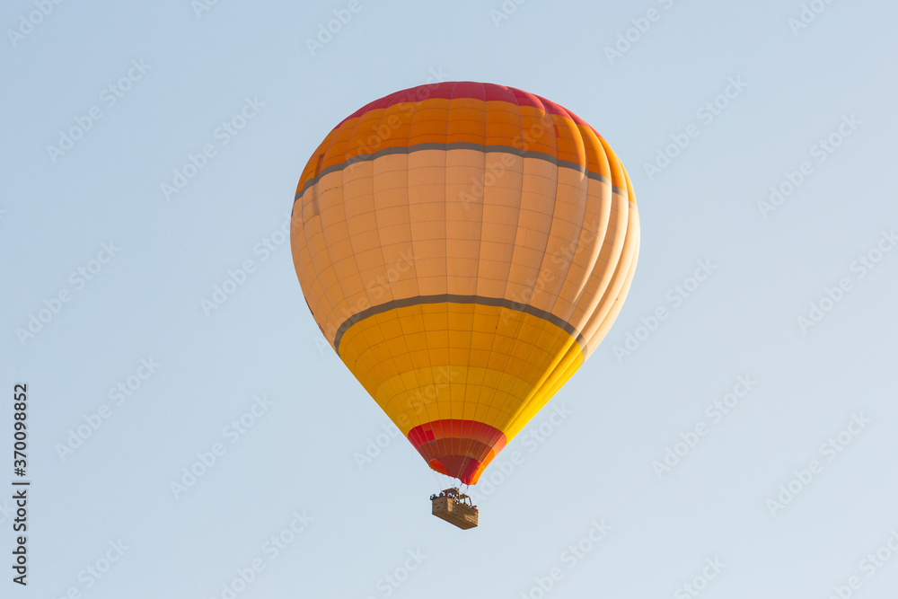 Fototapeta premium Hot air balloons profiled on clear blue sky, in Cappadocia, Turkey