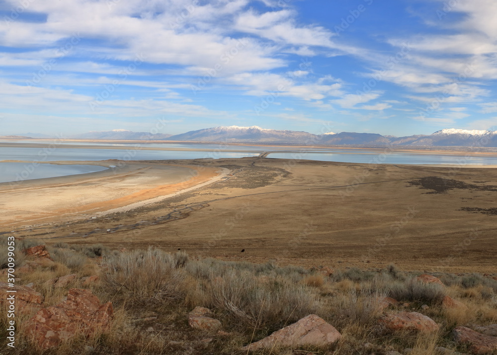 Landscape at Antelope Island surrounded by snowcapped mountains, Utah