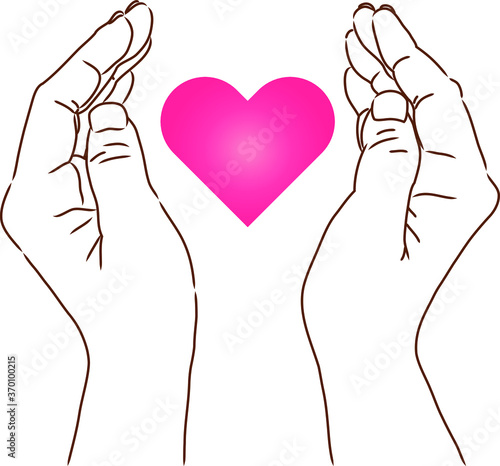 両手でハートを包み込む