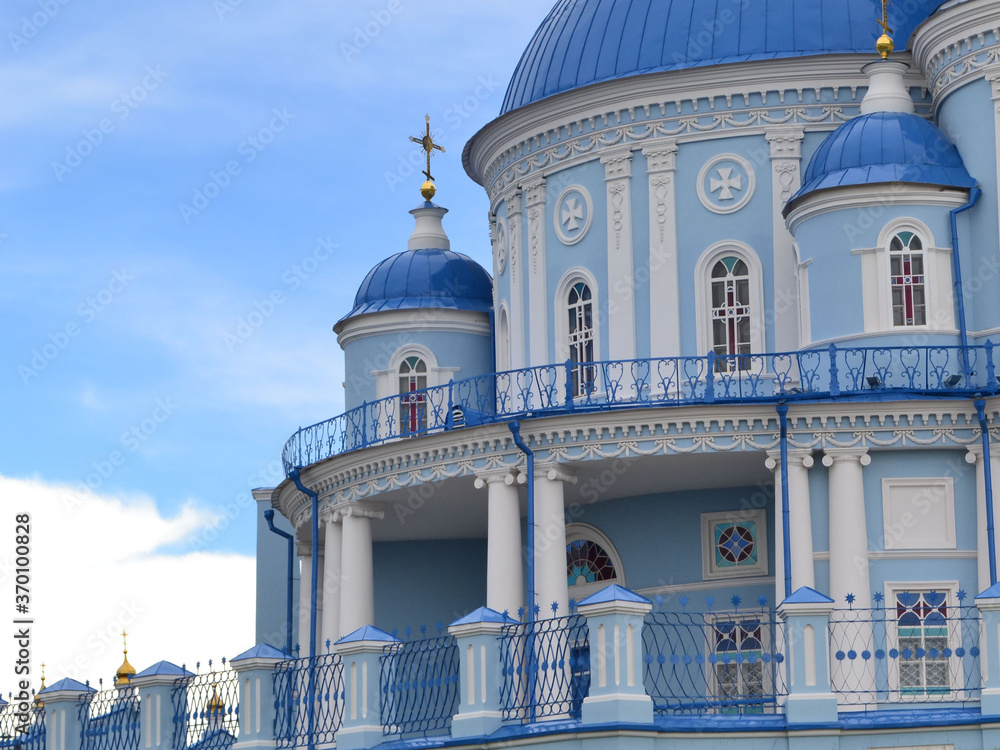 Fototapeta premium Orthodox Church in Russia. Church in blue and white. Church against the blue sky.
