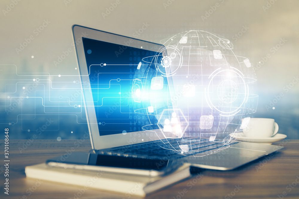 Computer on desktop with social network theme icon. Multi exposure. Concept of international connections. Computer on desktop with social network theme icon. Multi exposure. Concept of international connections.