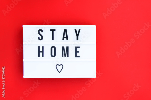 Motivational poster with quote Stay home. Saying for protection from disease and virus spread