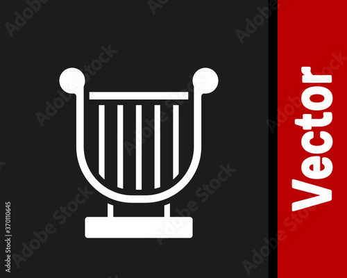 White Ancient Greek lyre icon isolated on black background. Classical music instrument, orhestra string acoustic element. Vector.