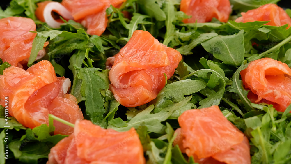 fresh sliced salmon and arugula salad fresh sliced salmon and arugula salad