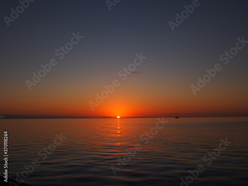 sunset over the sea © Hello Happy