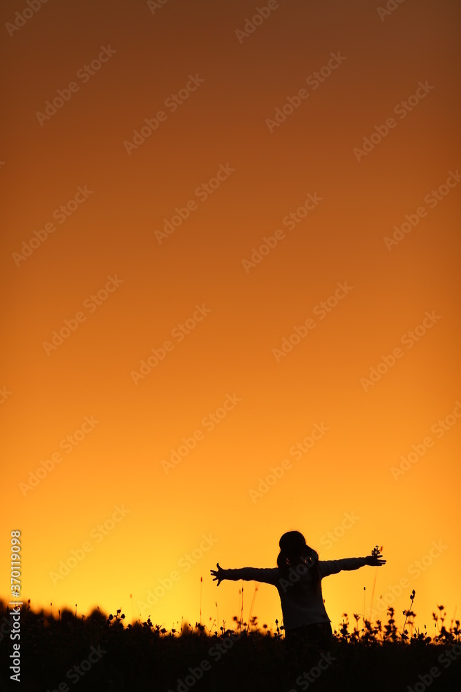beautiful sunset orange sky girl happiness raising her hands beautiful sunset orange sky girl happiness raising her hands