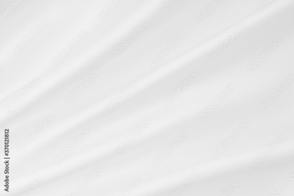 Smooth elegant white silk or satin luxury cloth texture as wedding background. Luxurious background design Smooth elegant white silk or satin luxury cloth texture as wedding background. Luxurious background design