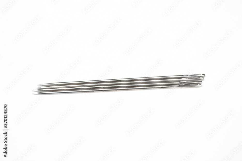 Sewing needle isolated on white background. Sewing needle isolated on white background.