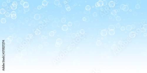Random soap bubbles abstract background. Blowing b