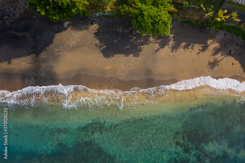 Aerial shot of the tropical bay with sandy beach. Amed  Bali  Indonesia