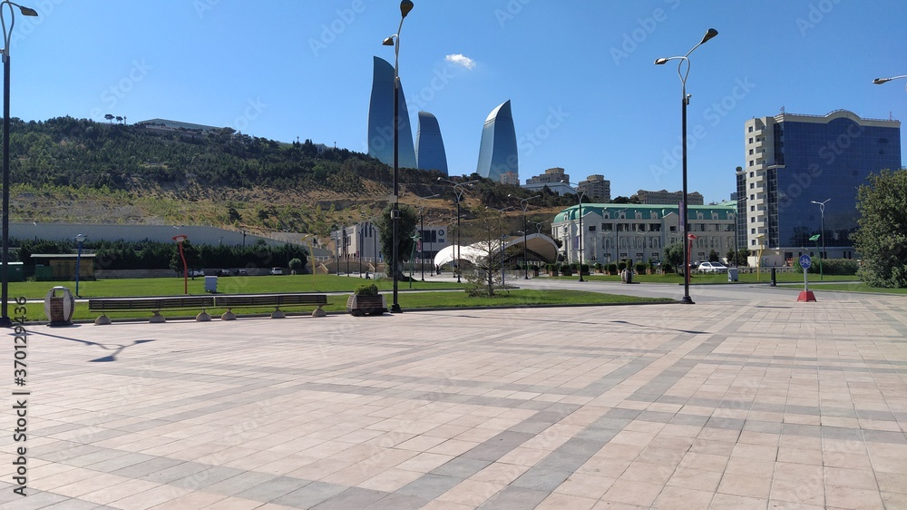 View to Flame Towers Baku from Baku Boulevard. Seaside Boulevard park in Baku Azerbaijan