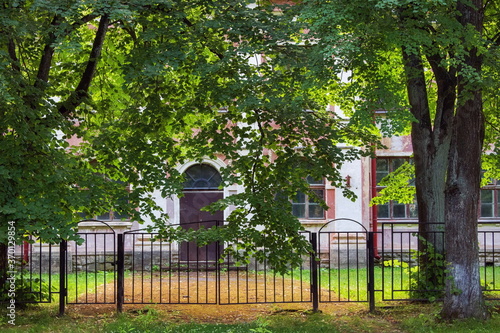 A beautiful twentieth century building in a summer courtyard