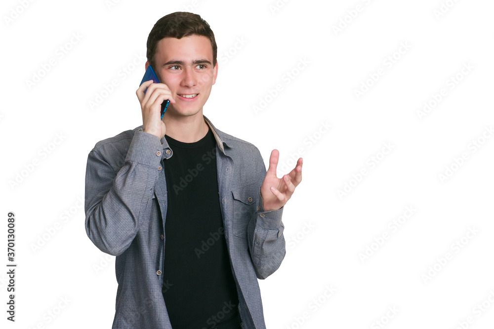 A young man in a Manatee shirt, black t-shirt and trousers, isolated on white A young man in a Manatee shirt, black t-shirt and trousers, isolated on white