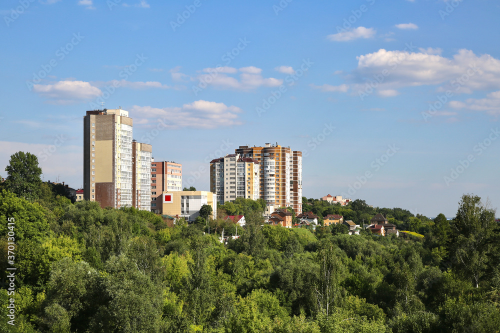 City landscape on a summer sunny day. City landscape on a summer sunny day.