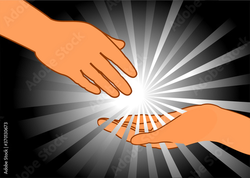 Reaching and touching hands. Bright light star flare . Concept for salvation, rescue, friendship. Black background.