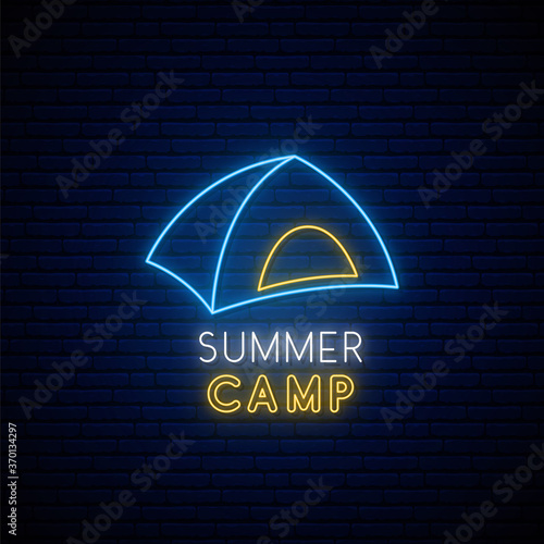 Neon camping sign. Bright glowing tent icon on dark brick wall background. Concept template for summer camp, camping, nature tourism in neon style. Vector illustration.