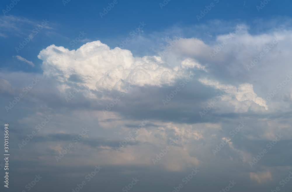 White cumulus clouds in blue sky background White cumulus clouds in blue sky background