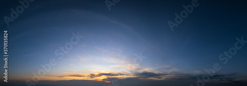 Sunset dusk sky with clouds  wide background panorama .