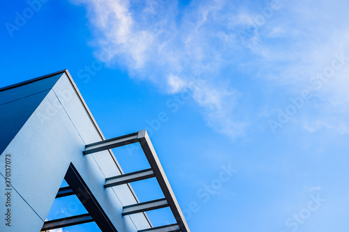 Blue tones for a beautiful and elegant building  with a terrace to watch the sunset with the blue sky in the background.