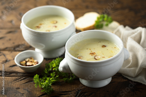 Homemade white asparagus soup with hazelnut
