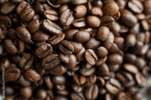Fresh arabica coffee beans as a texture or background.