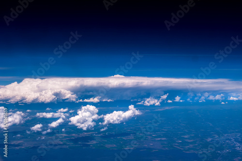 Aerial view of the fantastic and curious clouds, View on an airplane,