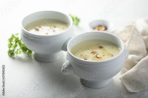 Homemade white asparagus soup with hazelnut