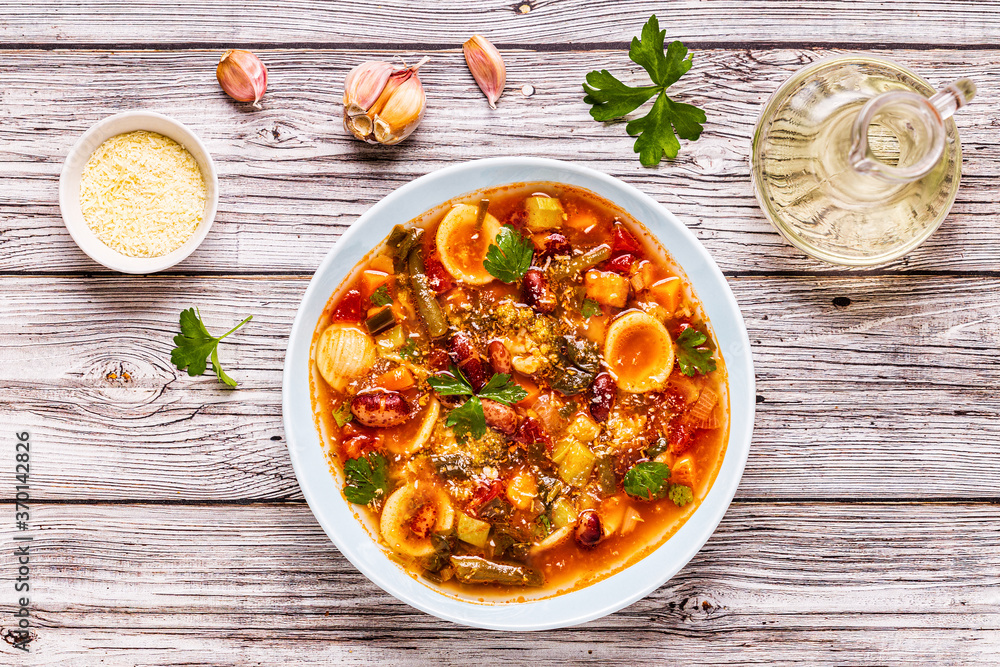 Minestrone, italian vegetable soup with pasta and beans. Minestrone, italian vegetable soup with pasta and beans.