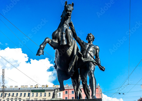 Sculpture tamer of horses on Anichkov bridge. St. Petersburg, Russia