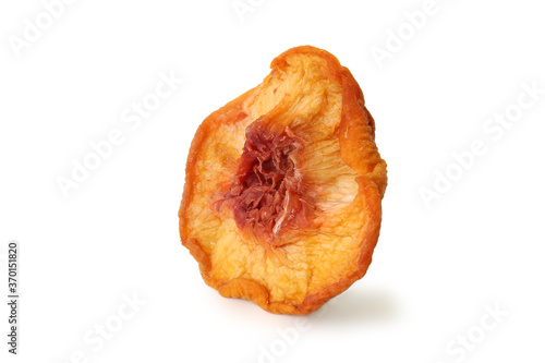 One slice of dried peach isolated on white